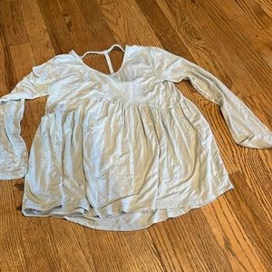 I'm selling a green tee (long sleeve) the size is M 7/8